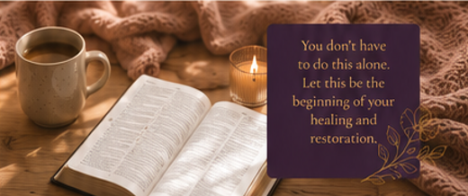 An open Bible and a lit candle beside a card reading You don't have to do this alone. Let this be the beginning of your healing and restoration.